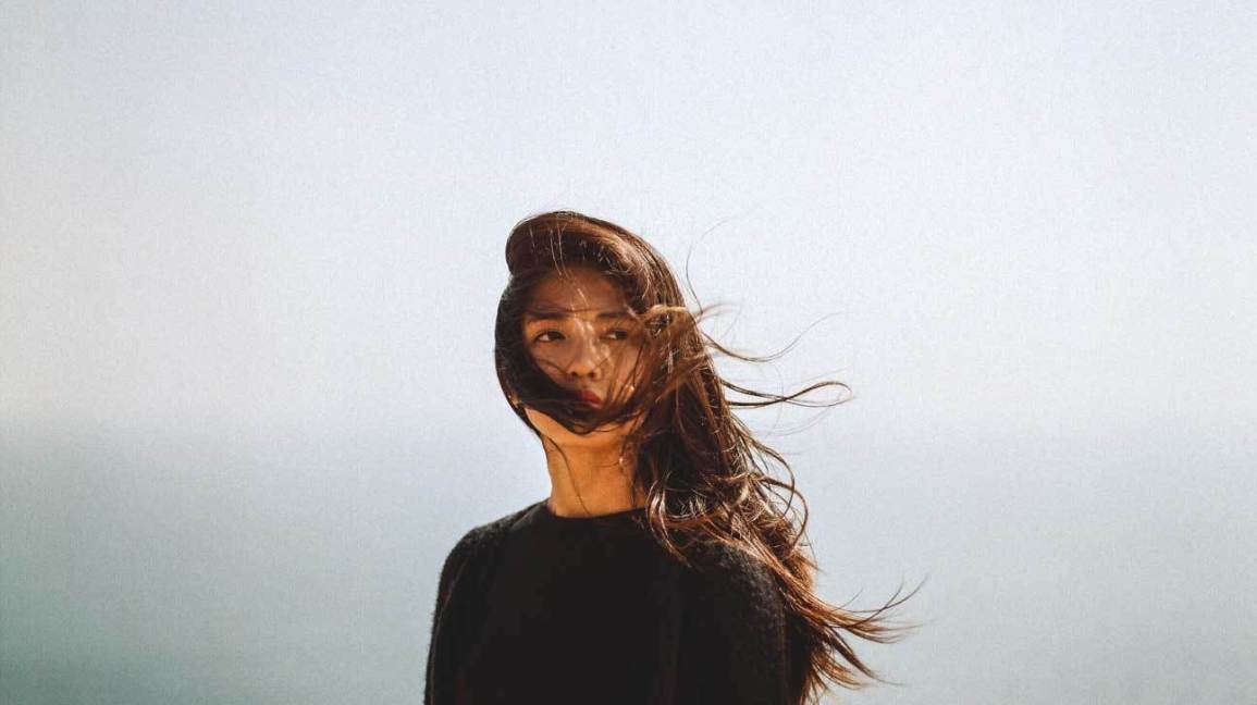 female_serious_outdoors-1296x728-header